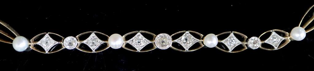 An Edwardian gold, old round and rose cut diamond and cultured? pearl set pierced oval link bracelet,